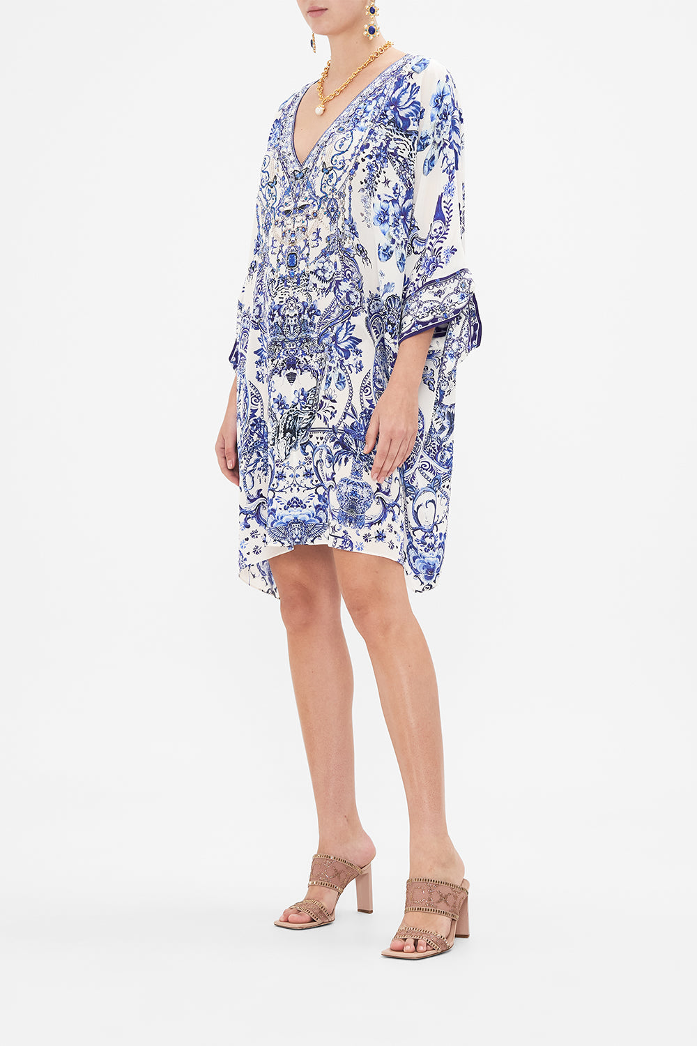 Side view of model wearing CAMILLA silk kaftan in Glaze and Graze print