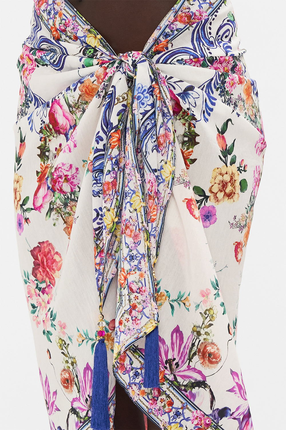 Detail view of model wearing CAMILLA resort wear sarong in Dutch Is Life print