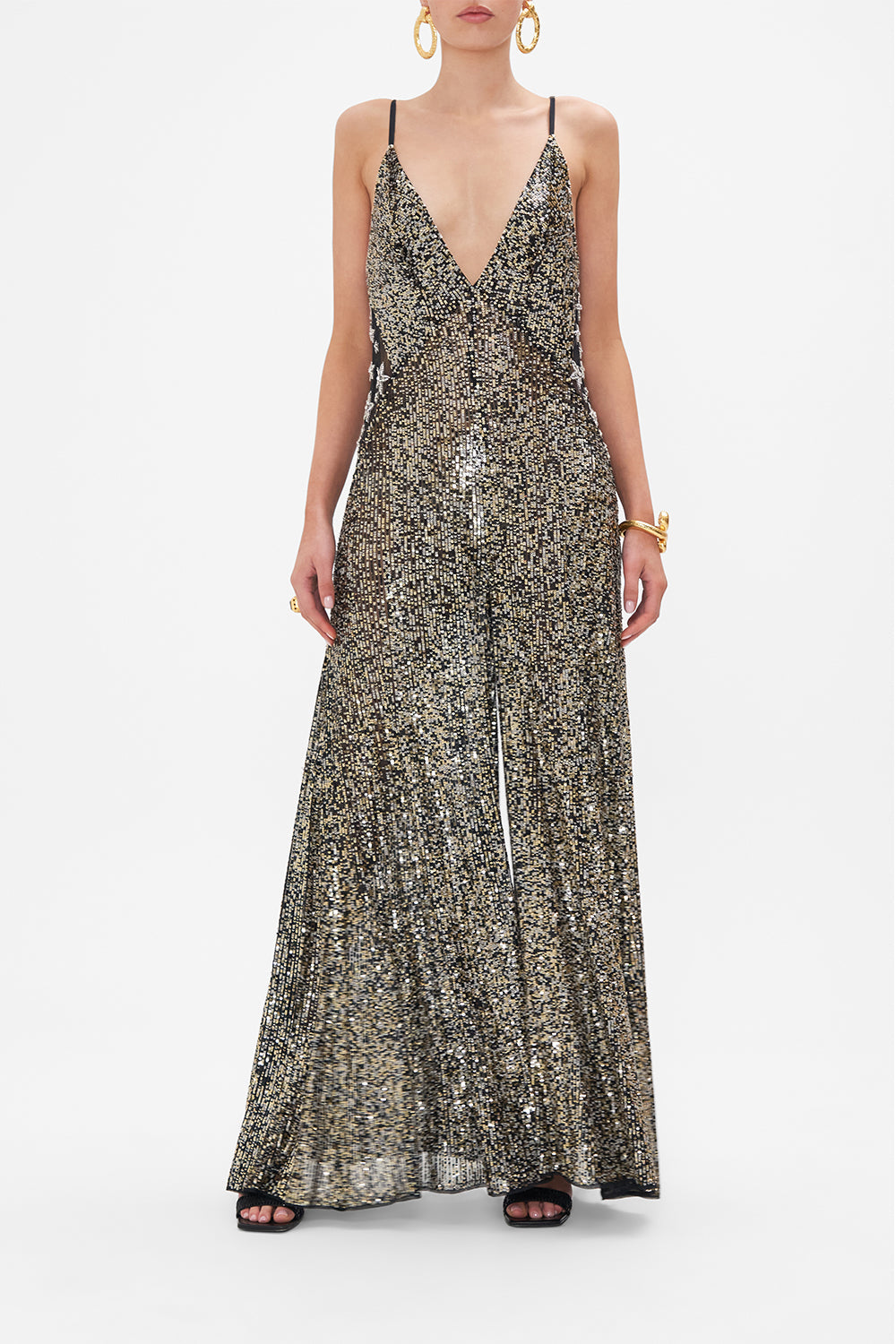 Front view of model wearing CAMILLA sequinned jumpsuit in Chaos In The Cosmos
