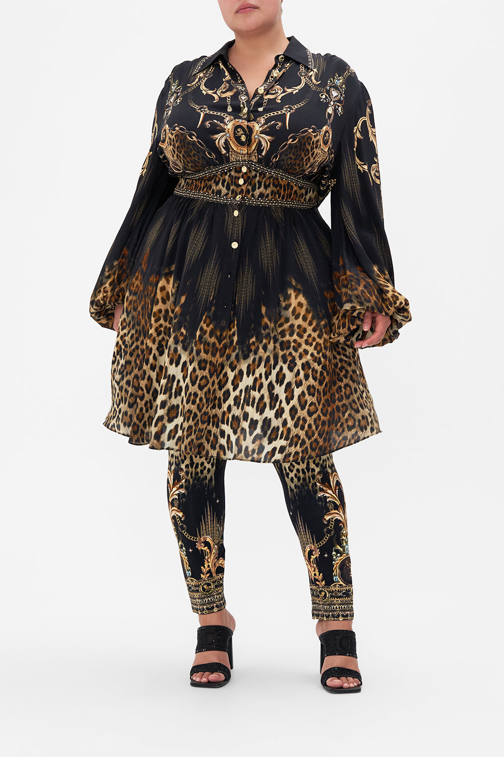 Front view if curvy model wearing CAMILLA plus size leopard print leggings in Jungle Dreaming print