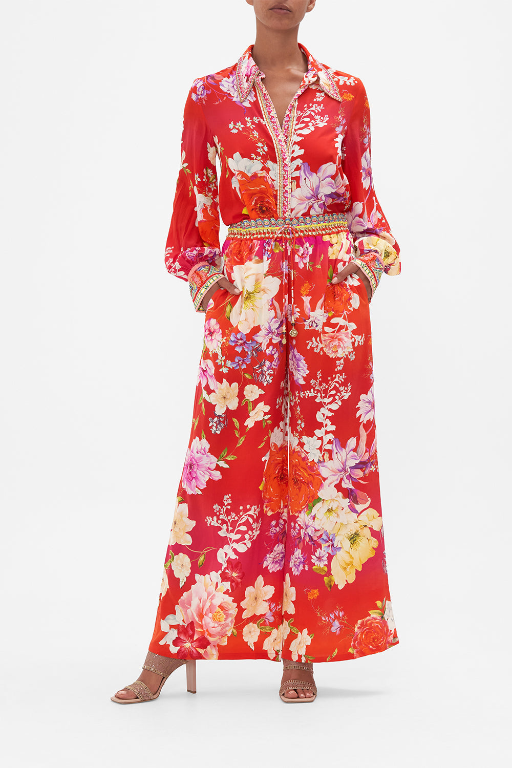 Front view of model wearing CAMILLA silk pants in Kiss And Tell floral print