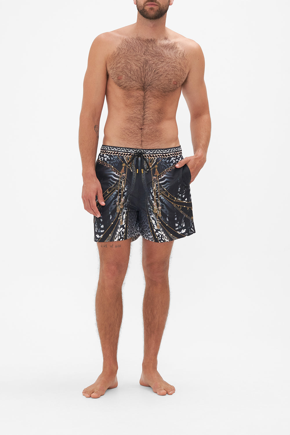 Front view of model wearing Hotel Franks by CAMILLA mens black boardshorts in Untamed Royalty print