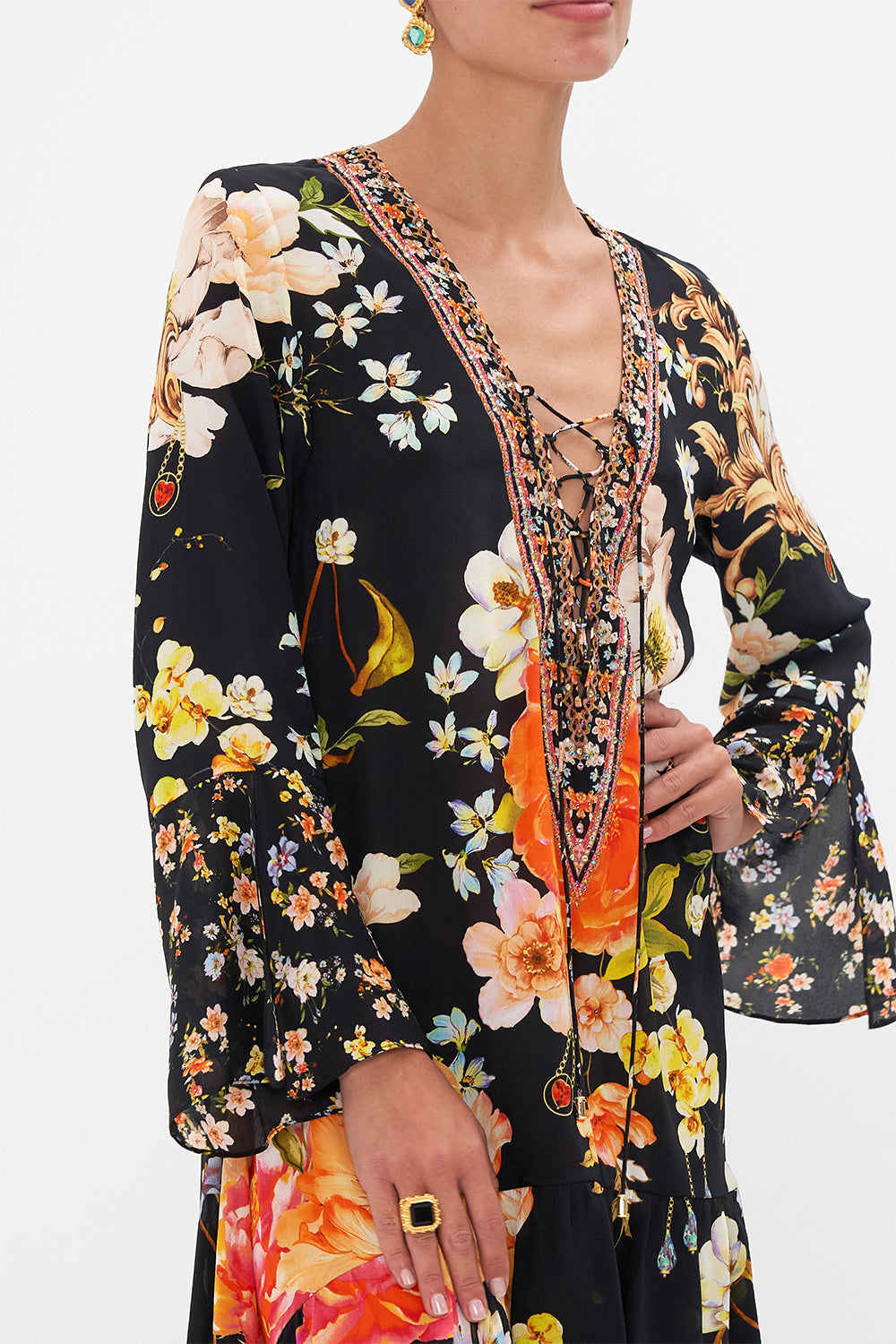 Detail view model wearing of CAMILLA floral silk dress in Secret History print