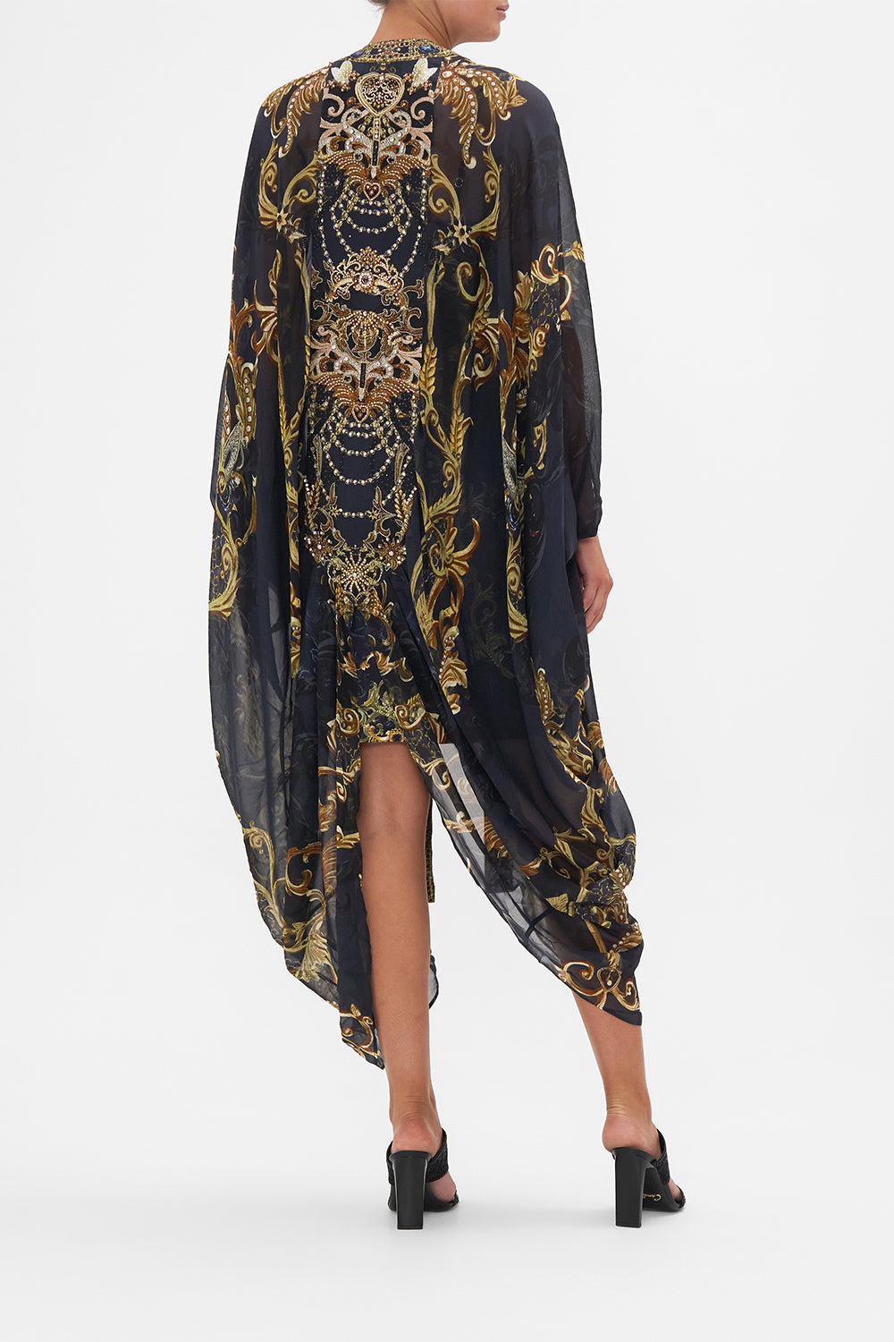 Back view of model wearing CAMILLA silk kimono in Moonlight Melodies print