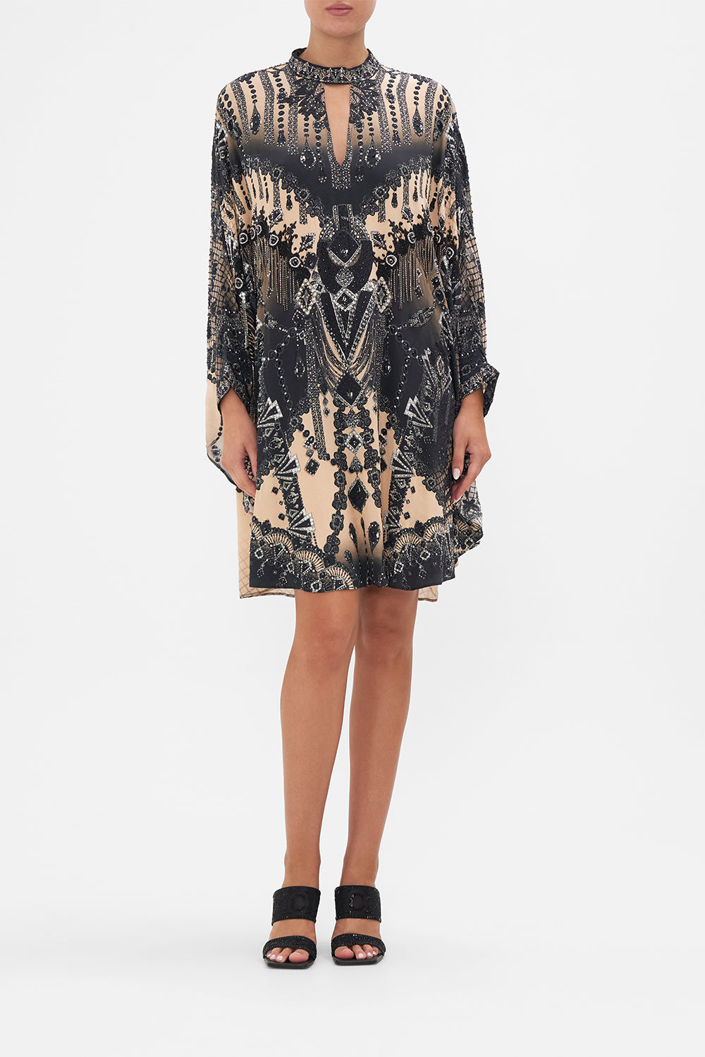 Front view of model wearing CAMILLA silk kaftan in Curtain Call Chaos print