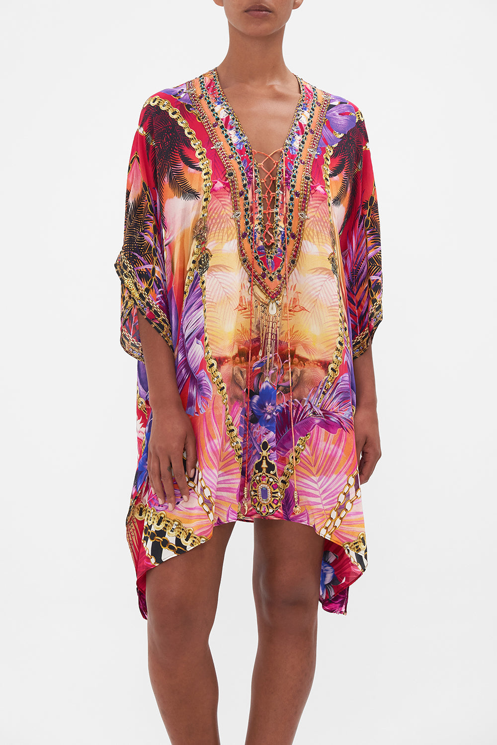 Detail view of model wearing CAMILLA resortwear silk kaftan in Wild Loving print