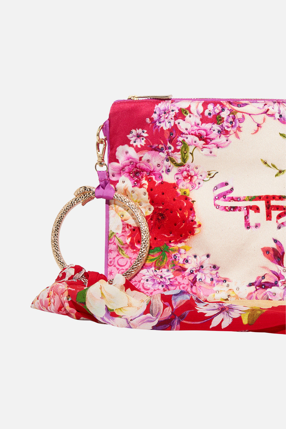 Detail view of CAMILLA silk ring scarf clutch in Kiss And Tell print