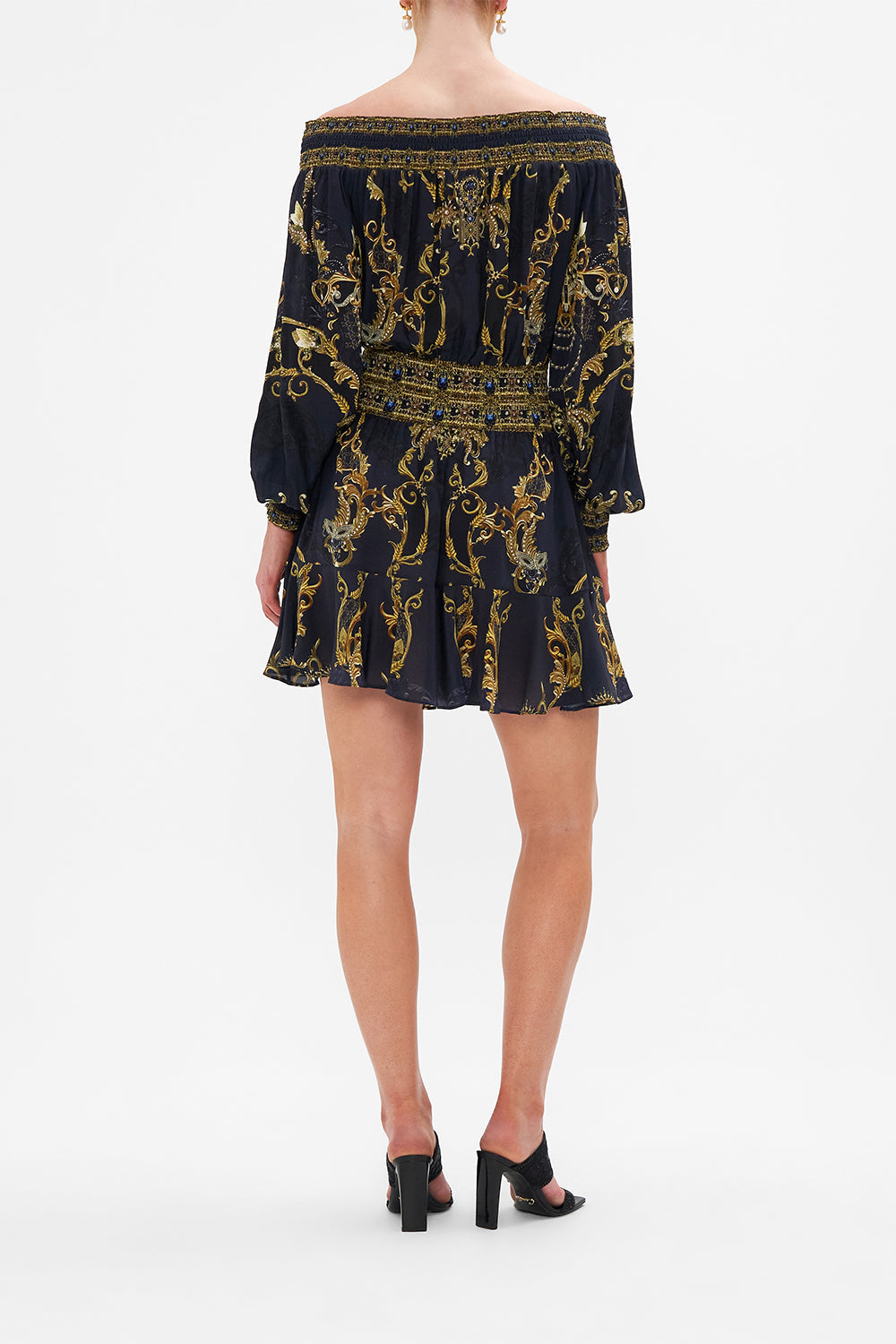 Back view of model wearing CAMILLA off the shoulder dress in Moonlight Melodies print