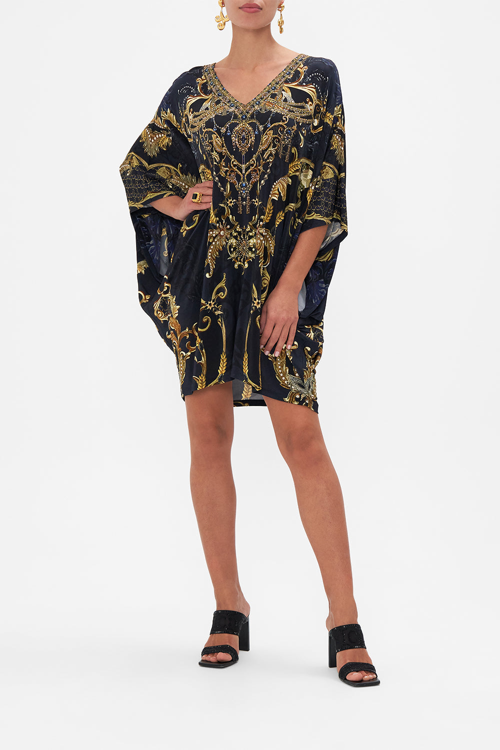 Front view of model wearing CAMILLA jersey bat sleeve dress in Moonlight Melodies print