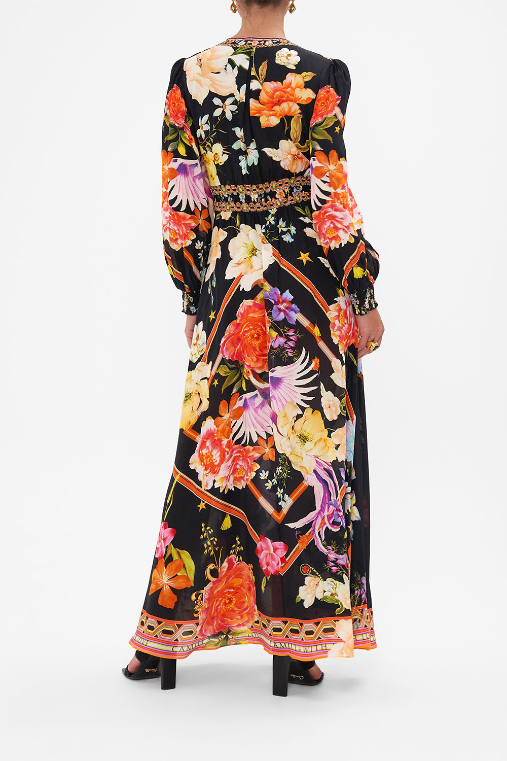 Back view of model wearing CAMILLA silk maxi dress in Secret History floral print