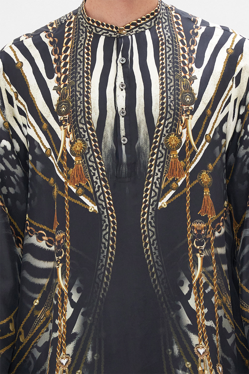 Detail view of model wearing Hotel Franks by CAMILLA mens black silk kaftan in Untamed Royalty Print