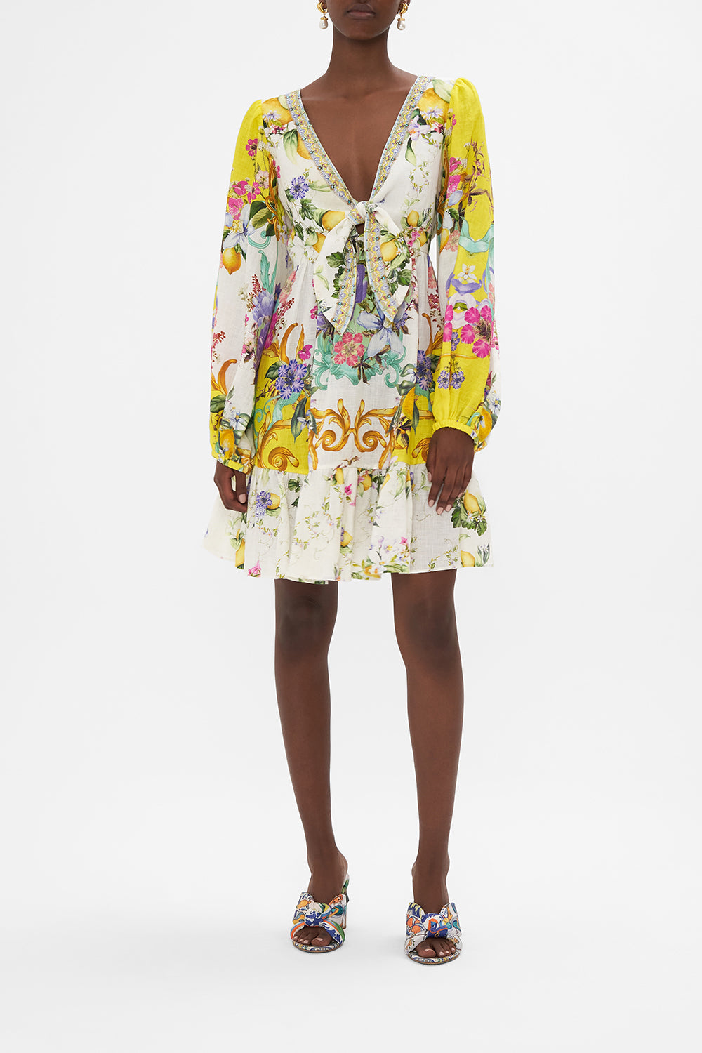 Front view of model wearing CAMILLA tie front linen dress in Caterina Spritz print
