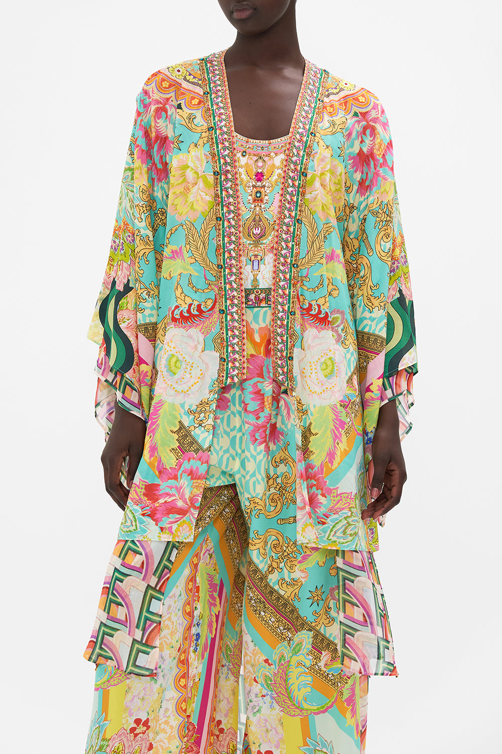 Crop view of model wearing CAMILLA silk kimono in An Italian Welcome print