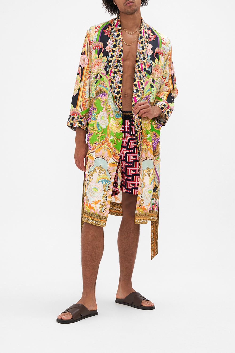 Crop view of model wearing HOTEL FRANKS BY CAMILLA mens silk robe in Sundowners in Sicily print