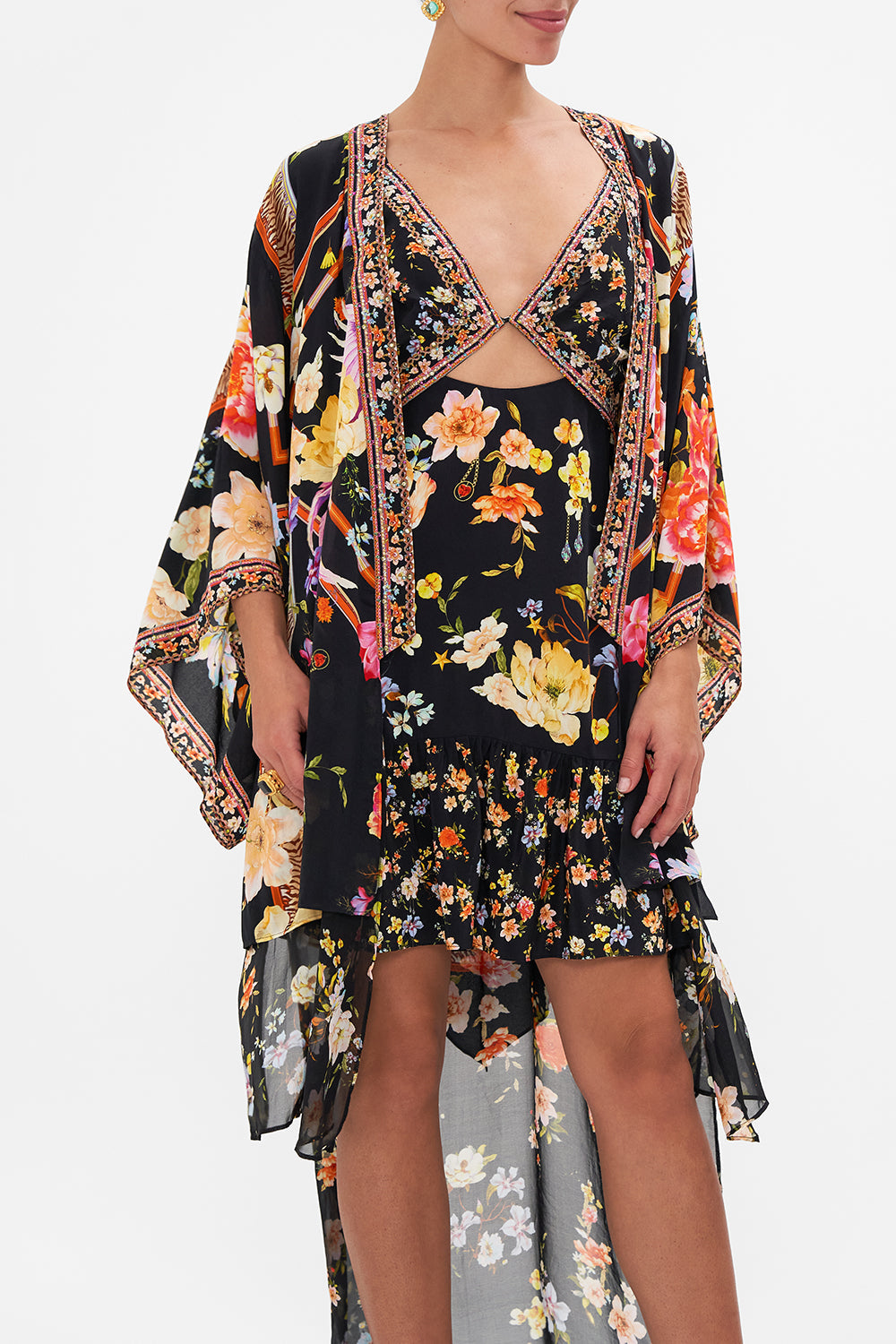 Crop view model wearing of CAMILLA floral silk kimono layer in Secret History print