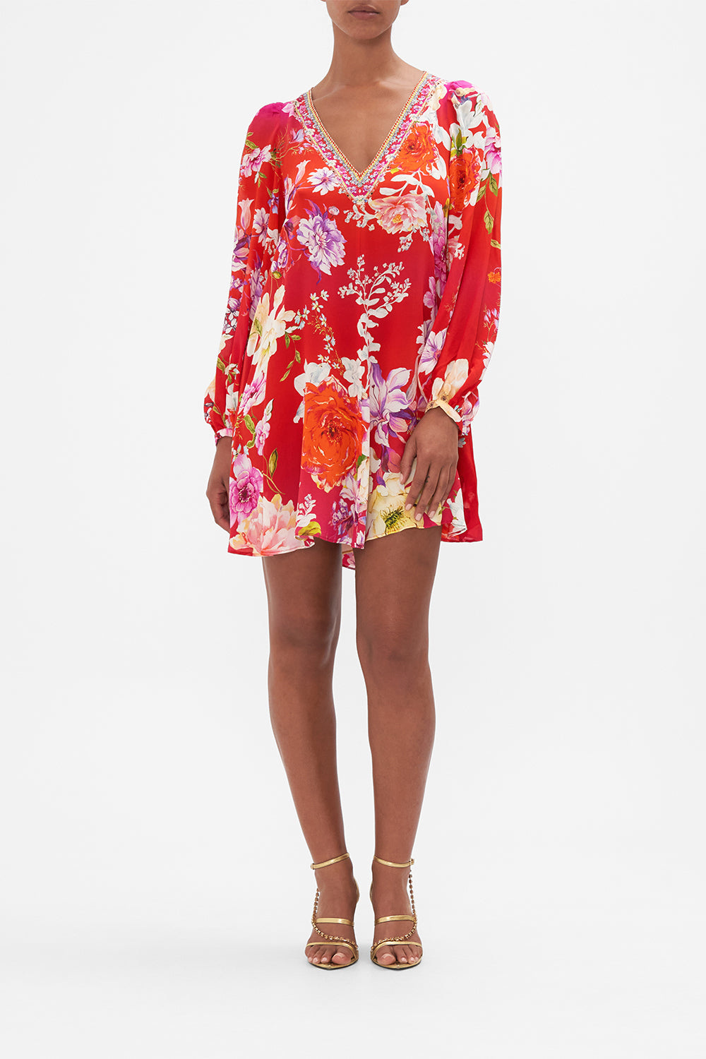 Front view of model wearing CAMILLA silk floral mini skirt in Kiss And Tell print