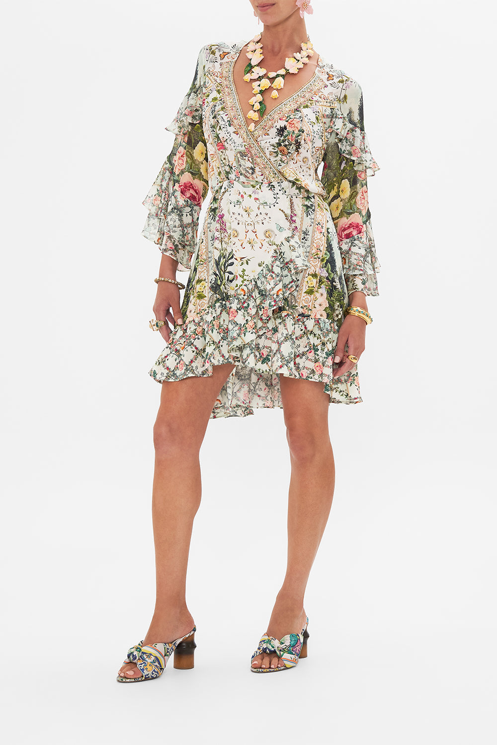 Side view of model wearing CAMILLA silk wrap dress in Renaissance Romance print