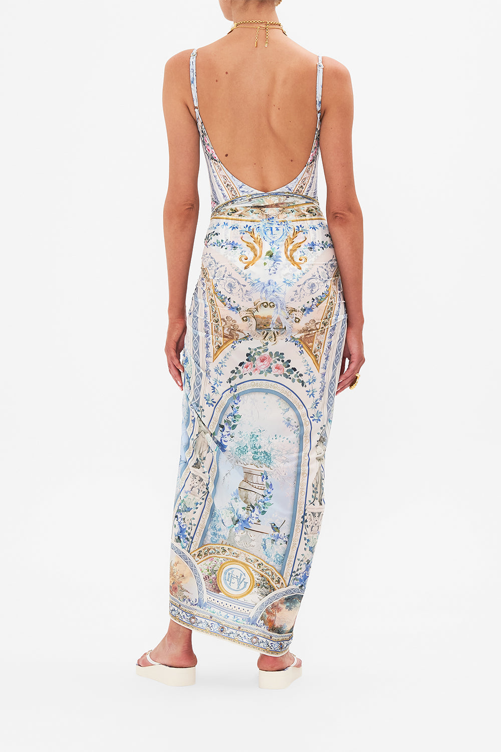 Back view of model waering CAMILLA long sarong in Season Of The Siren print