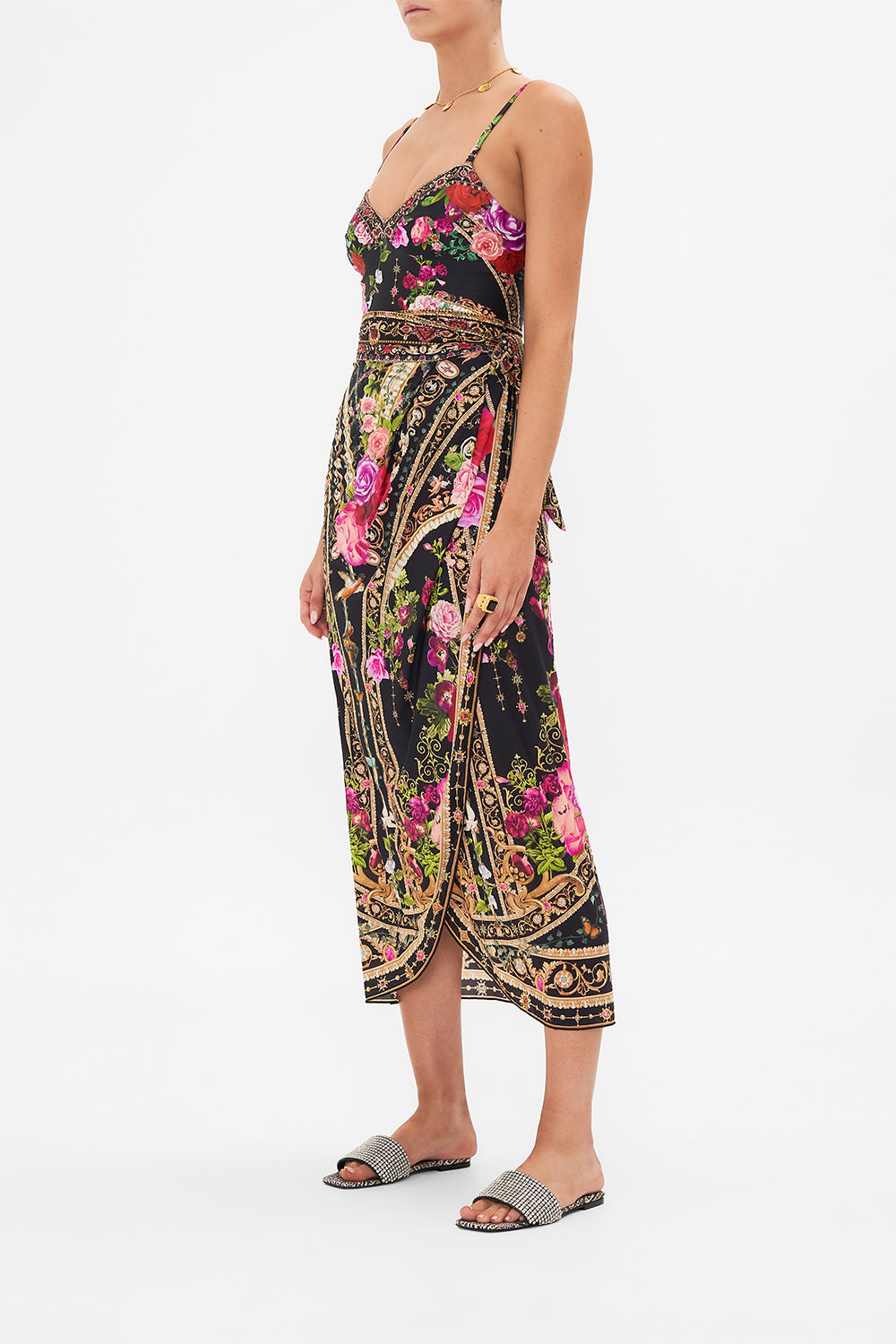 Side view of model wearing CAMILLA resortwear draped sarong in Reseravtion For Love print