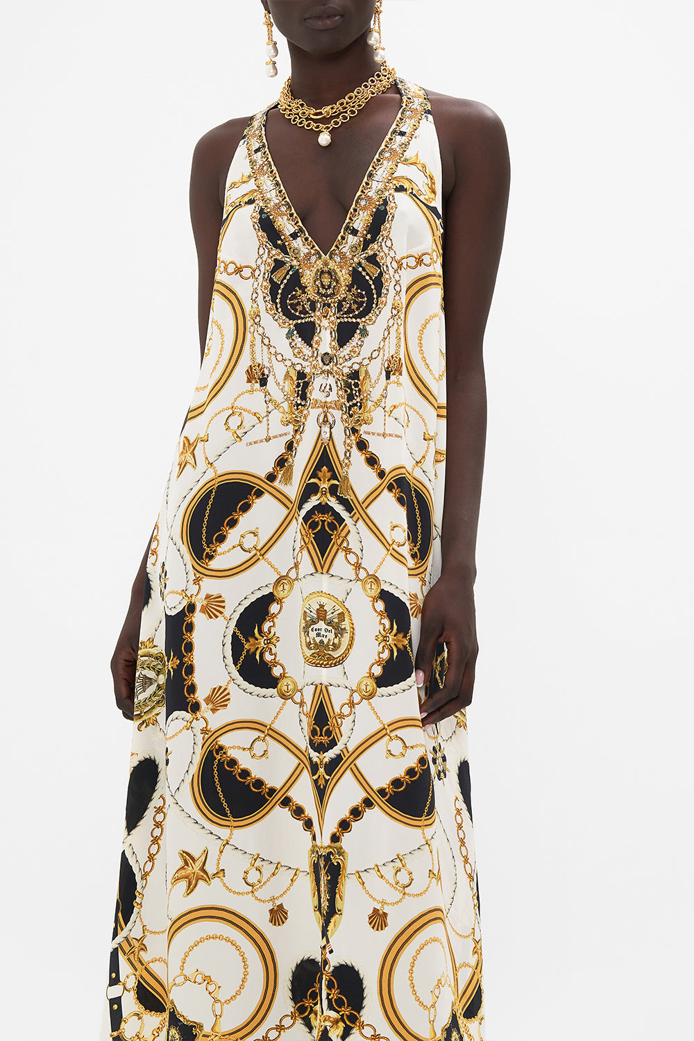 Crop view of model wearing CAMILLA reacerback dress in Sea Charm print