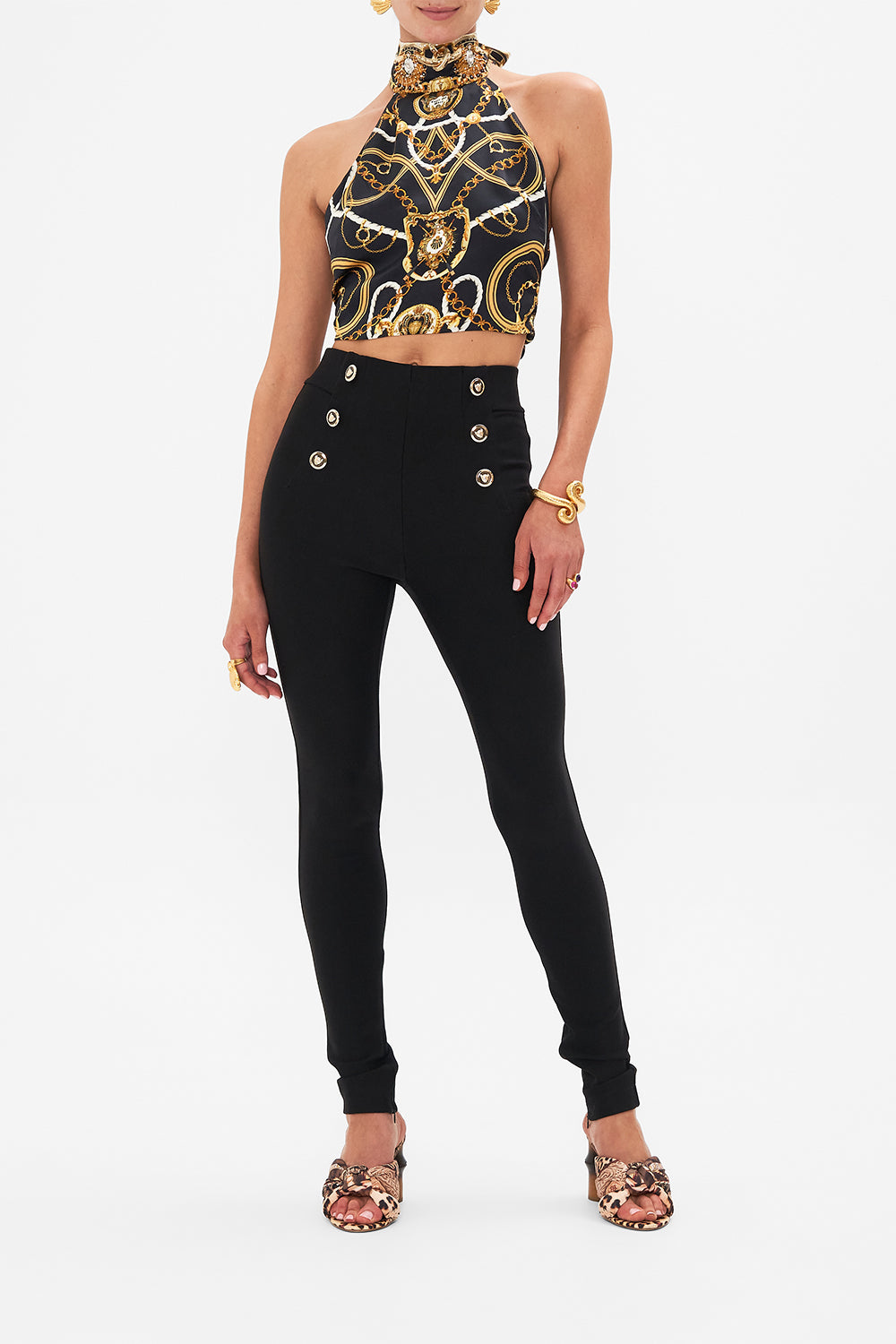 Front view of model wearing silk halter top in Coast To Coast print