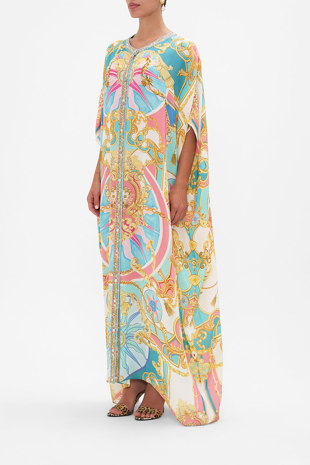 Side view of model wearing CAMILLA silk kaftan in Sail Away With Me print