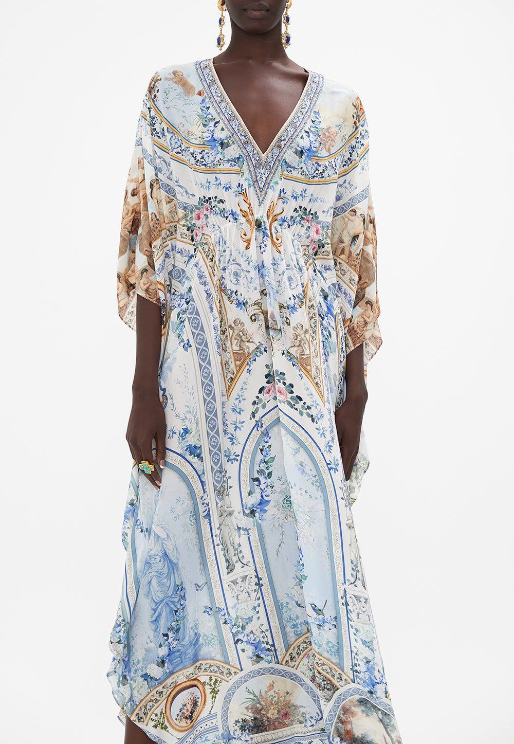 Crop view of model wearing CAMILLA silk kaftan in Season of The Siren print