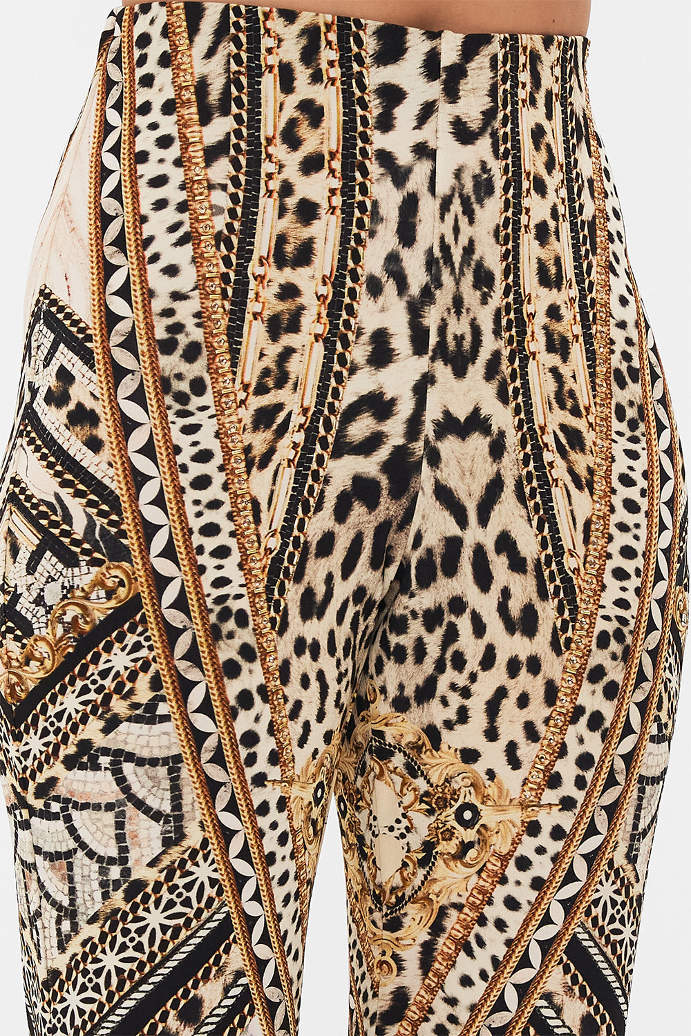 Detail view of model wearing CAMILLA flare pant in Mosaic Muse print