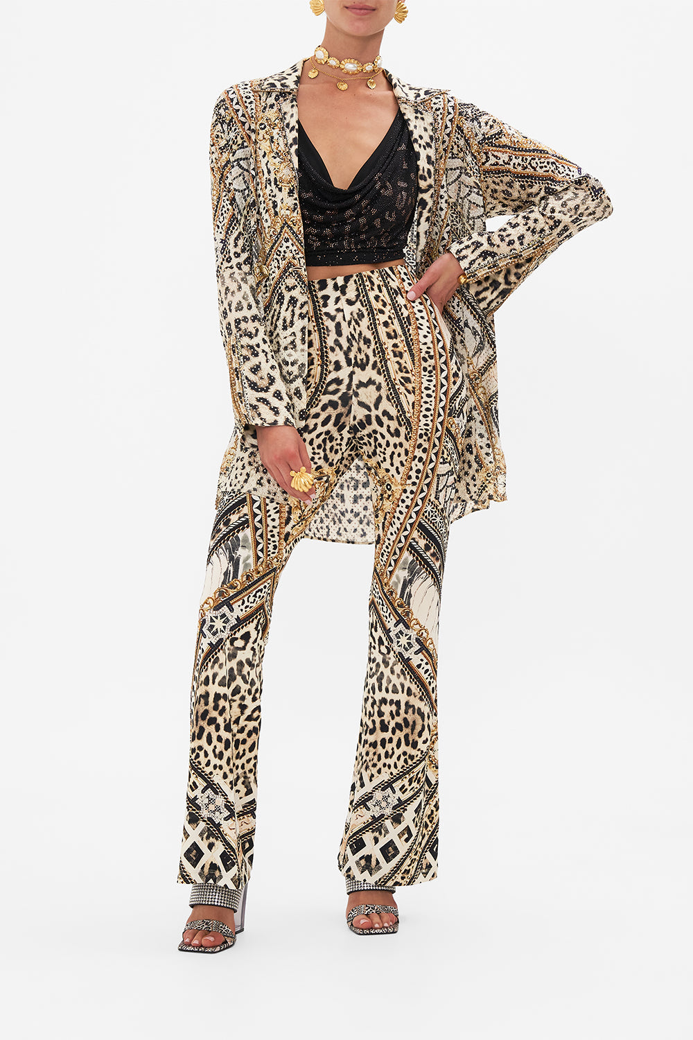 Style view of model wearing CAMILLA flare pant in Mosaic Muse print