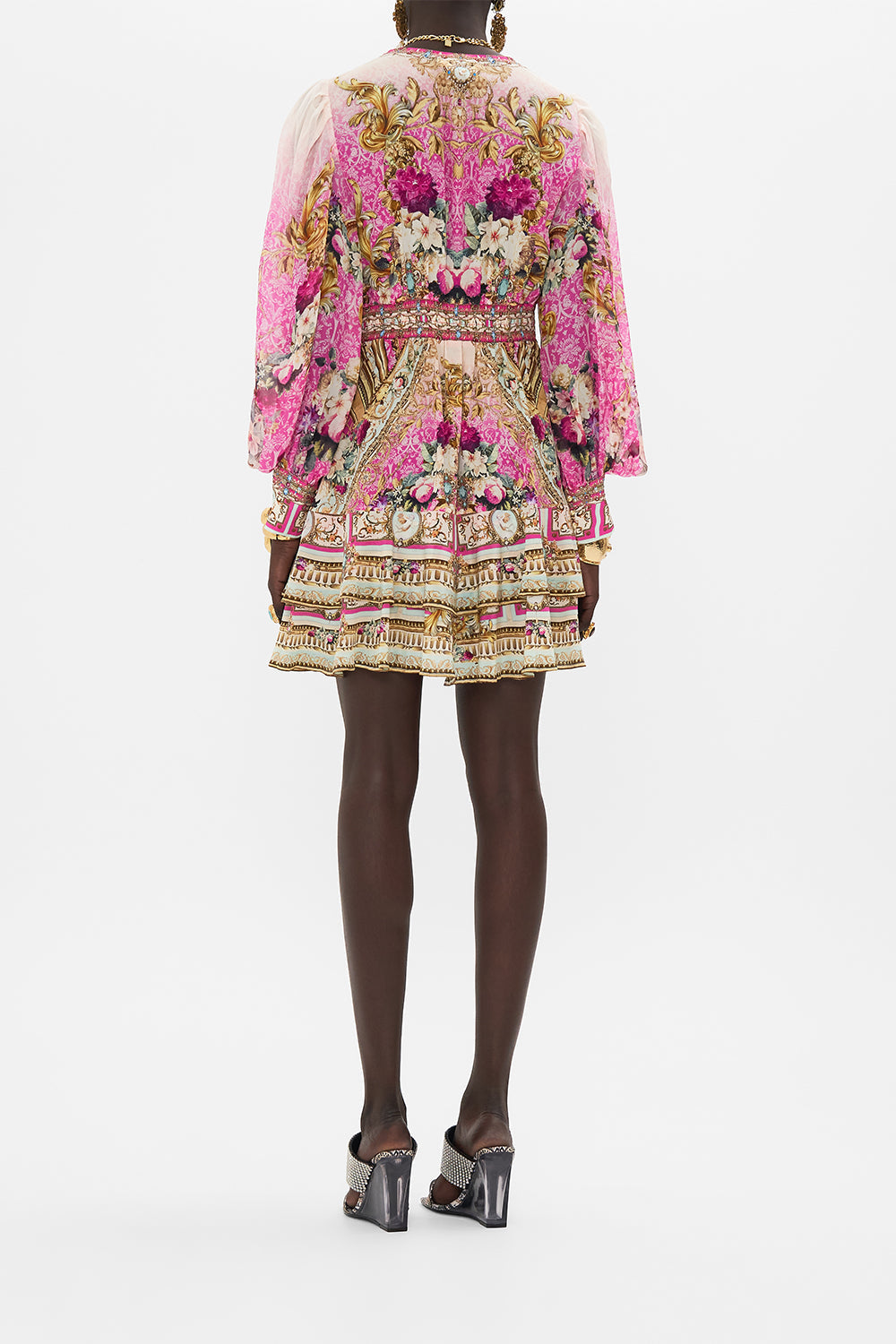 Back view of model wearing CAMILLA silk mini dress in Call of The Canal print