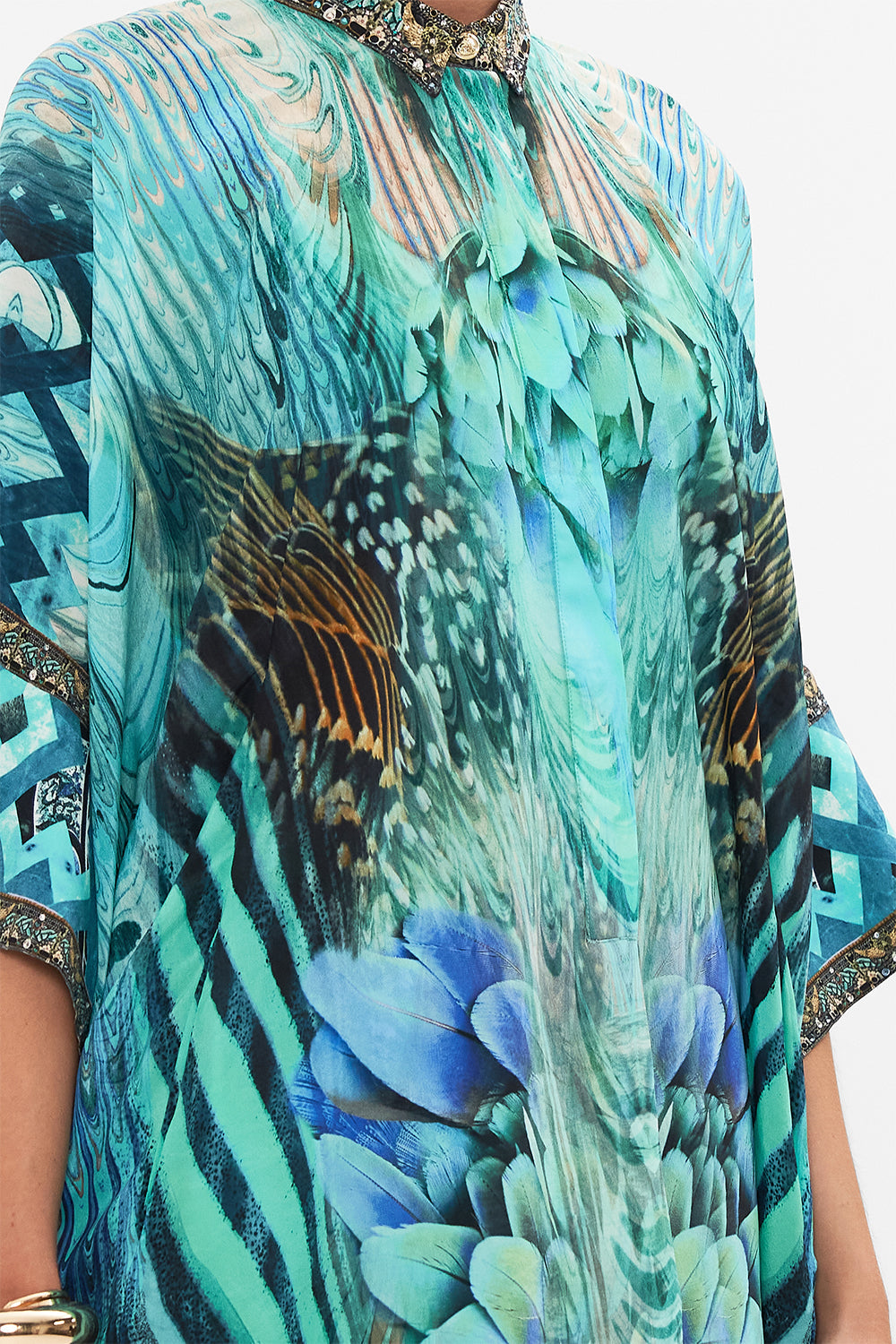 Detail view of model wearing CAMILLA silk shirt in Azure Allure print