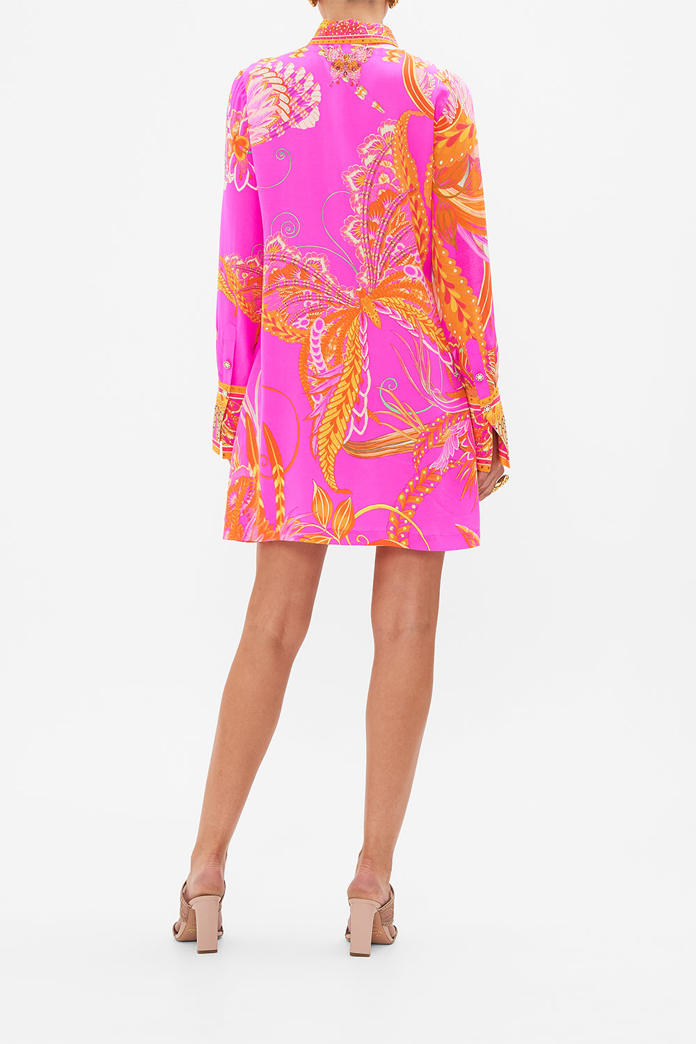 Back view of model wearing CAMILLA silk shirt dress in A Heart That Flutters print