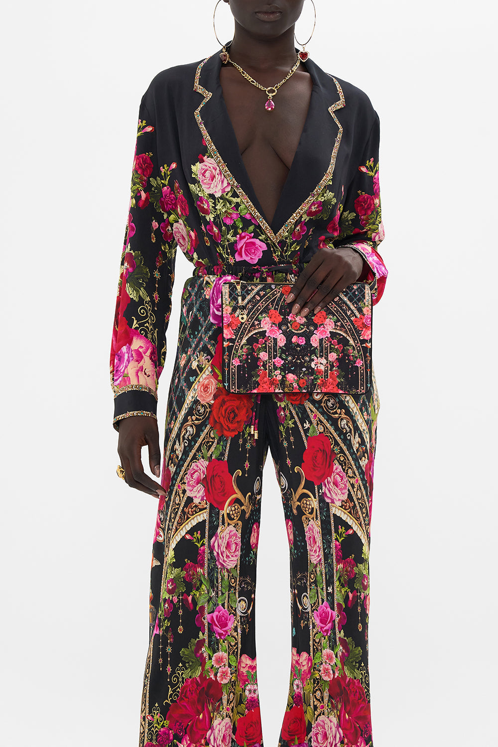 Product view of CAMILLA designer clutch bag in Reservation For Love print