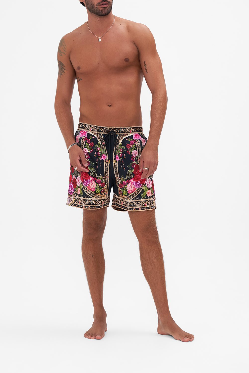 Front view of model wearing Hotel Franks by CAMILLA mens boardshorts in Reservation For Love print
