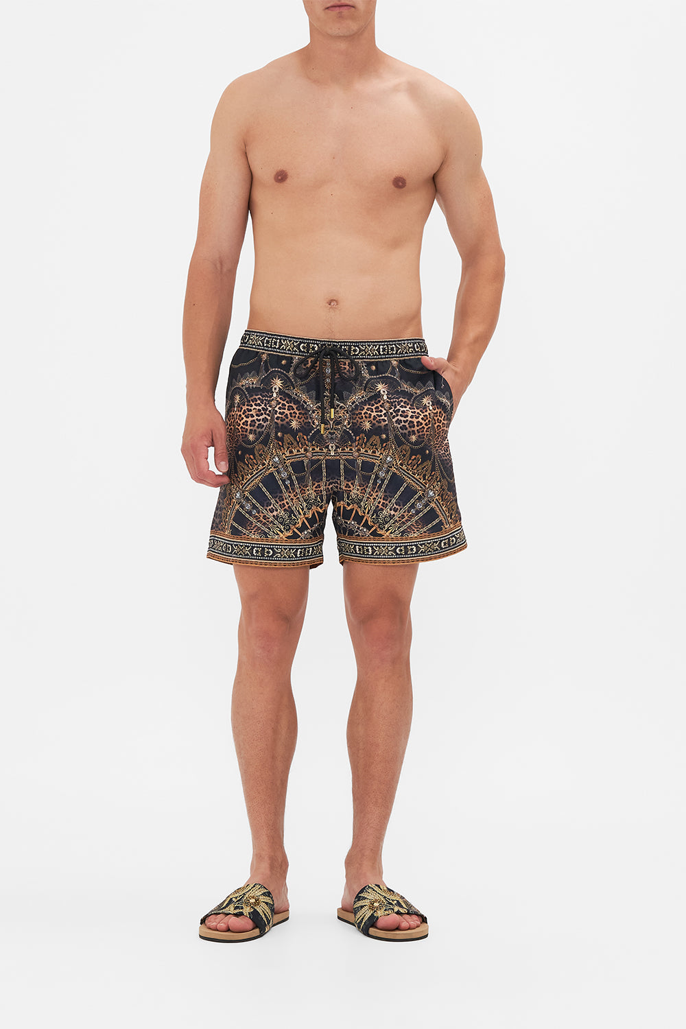 Front view of model wearing hotel franks By CAMILLA mens boardshort in Masked At Moonlight print