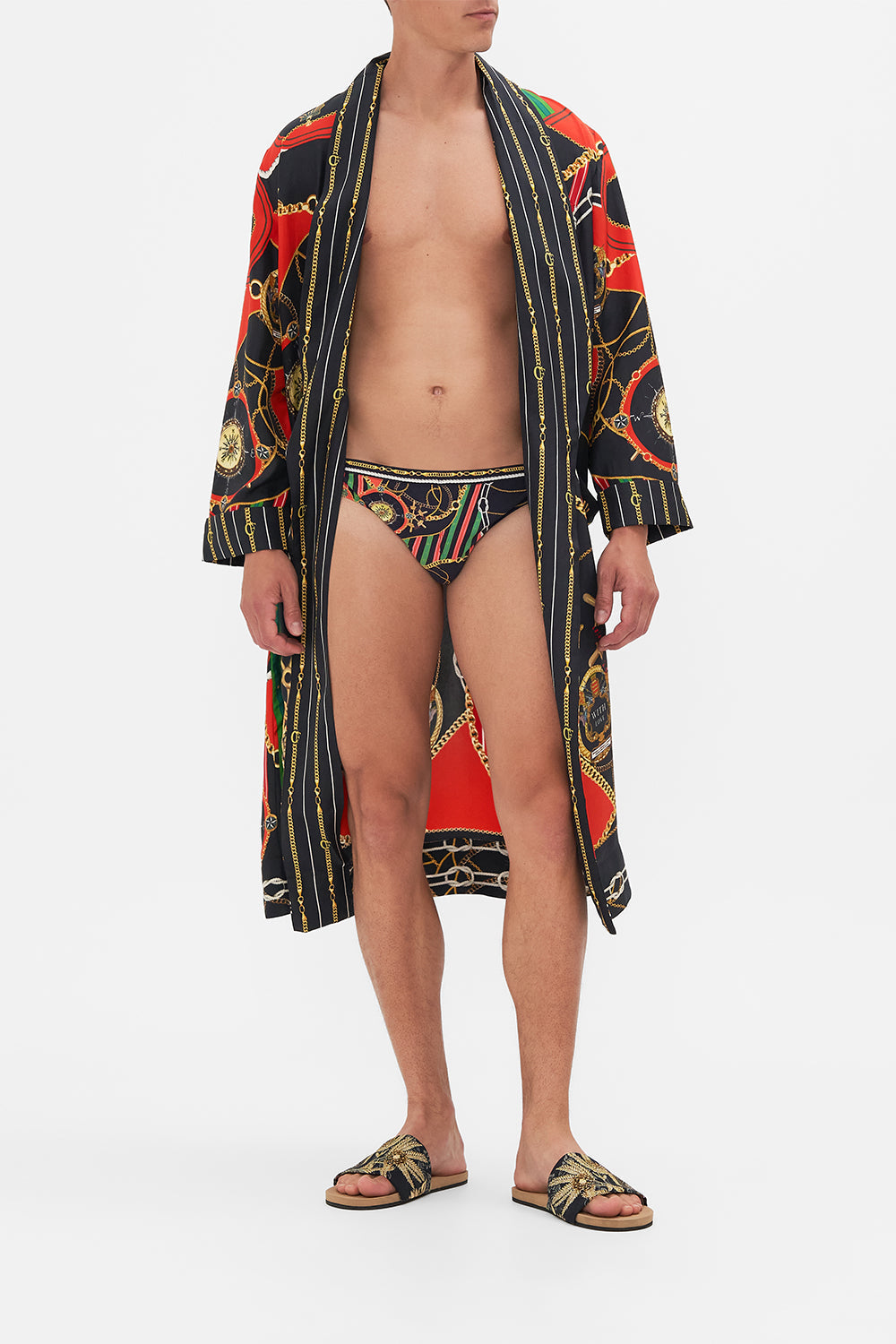 Front view of model wearing Hotel Franks By CAMILLA mens swim breif in Club Aperitivo print