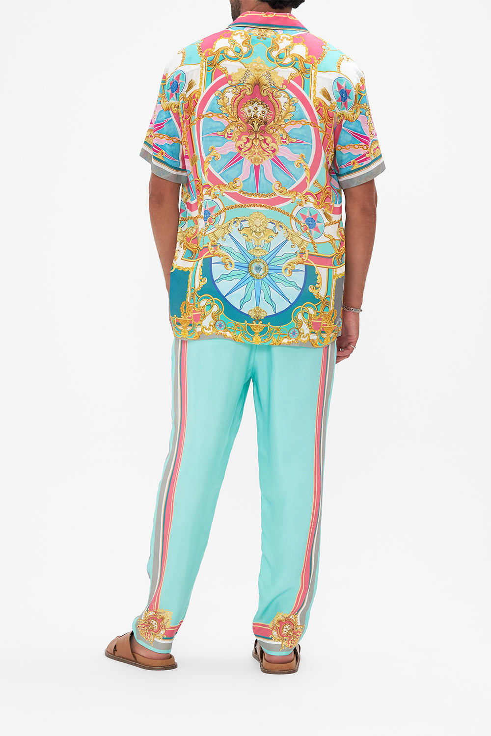 Back view of model wearing Hotel Franks By CAMILLA mens camp collared shirt in Sail Away With Me print