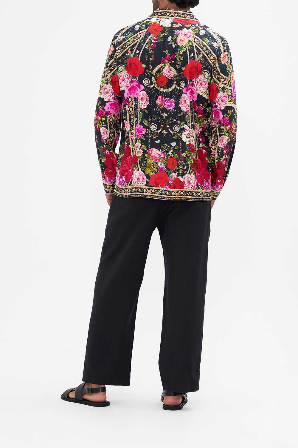 Back view of model wearing Hotel Franks by CAMILLA mens floral camp collared shirt in Reservation For Love print