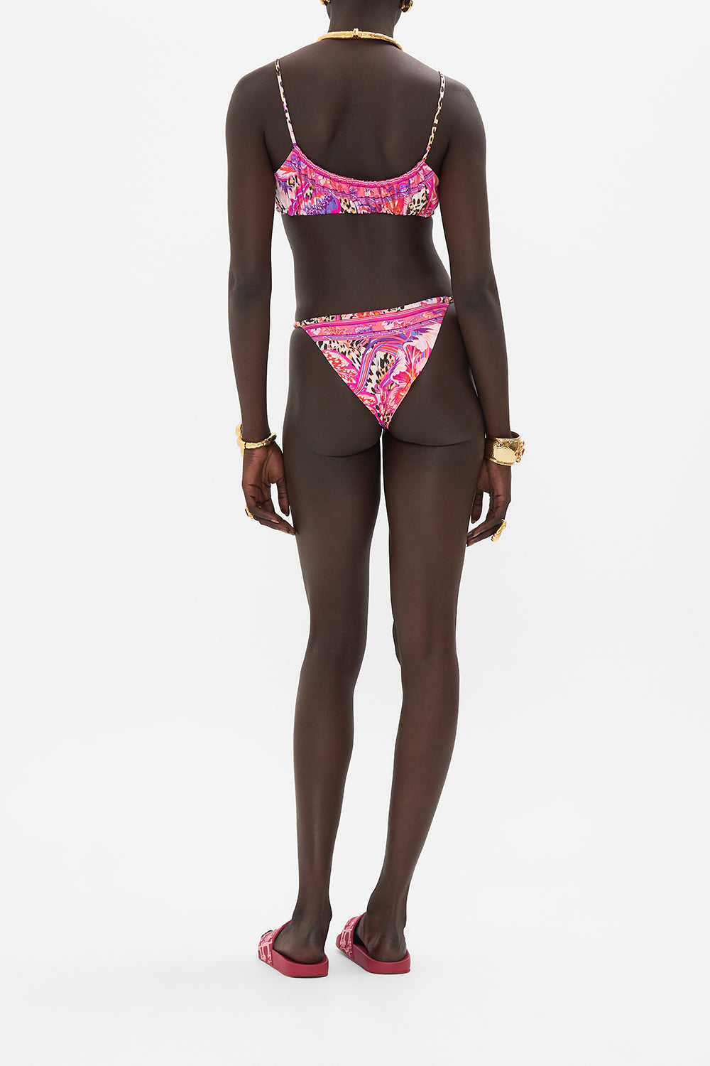 Back view of model wearing CAMILLA designer crop top in Viola Vintage print