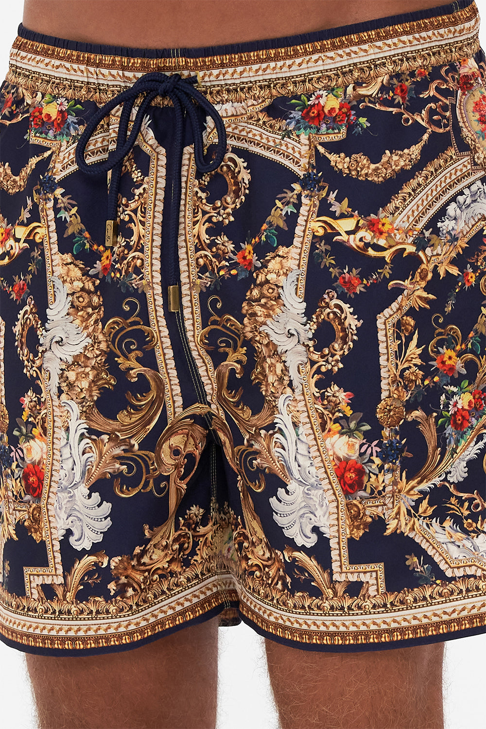 Detail view of model wearing Hotel Franks by CAMILLA mens boardshort in Venice Vignette print