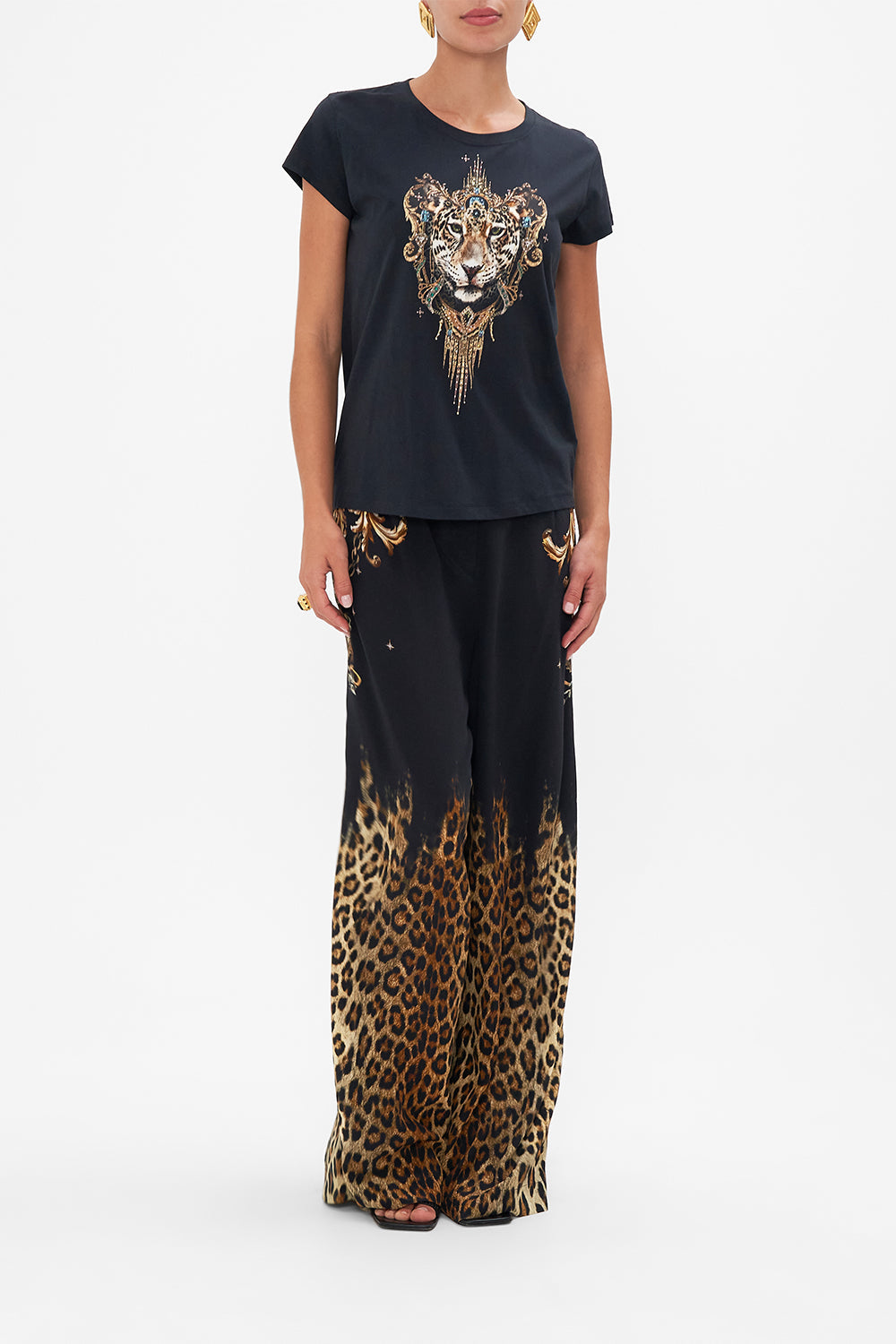 Front untucked view of model wearing CAMILLA black graphic tee in Lions Mane print