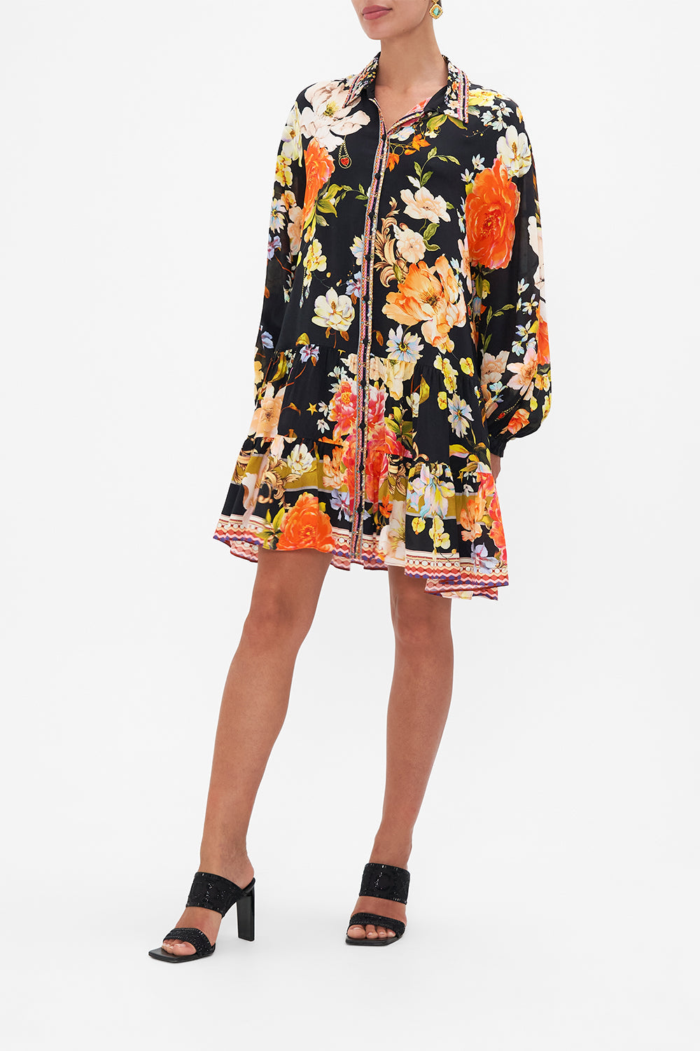 Side view of model wearing CAMILLA floral silk shirdress in Secret History print