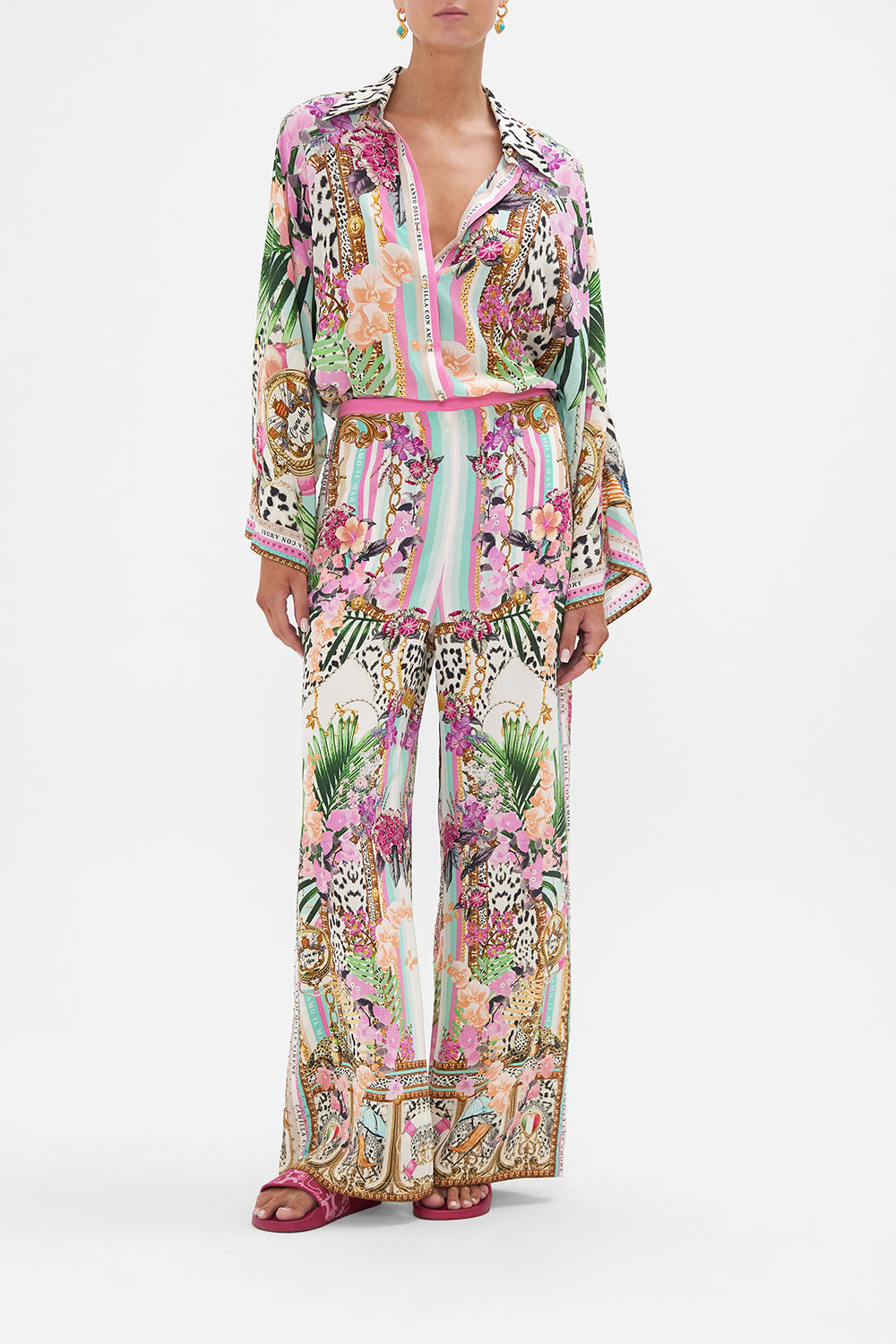 Front view of model wearing CAMILLA silk wide pants in Dear Amore Mio print