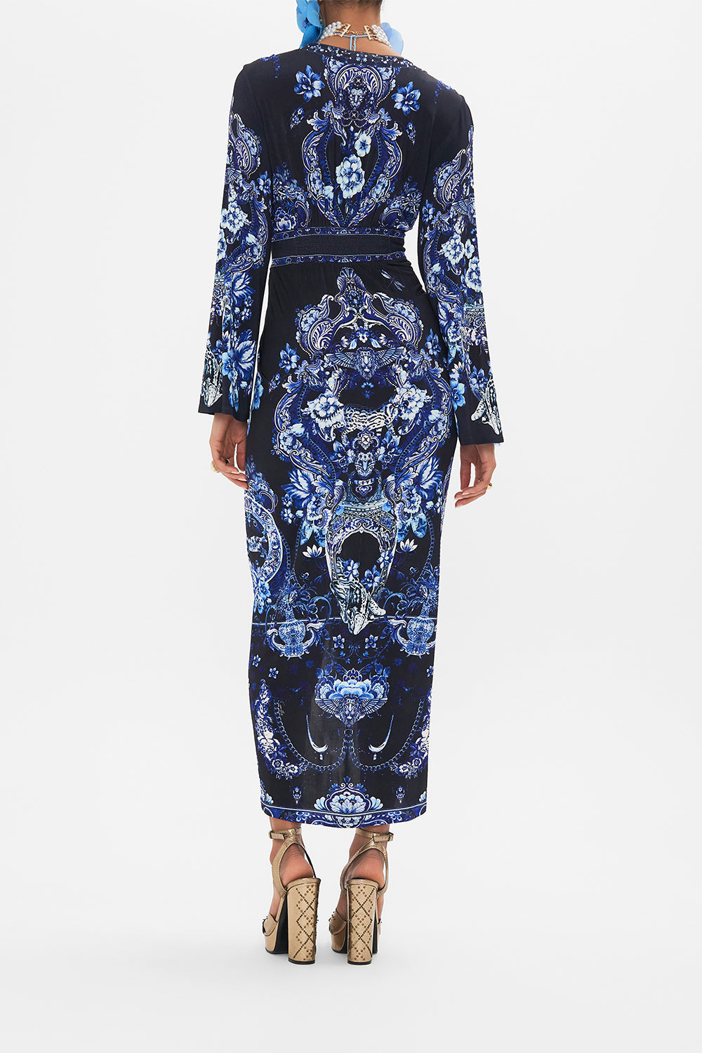 Back view of model wearing CAMILLAjersey dress in Delft Dynasty print