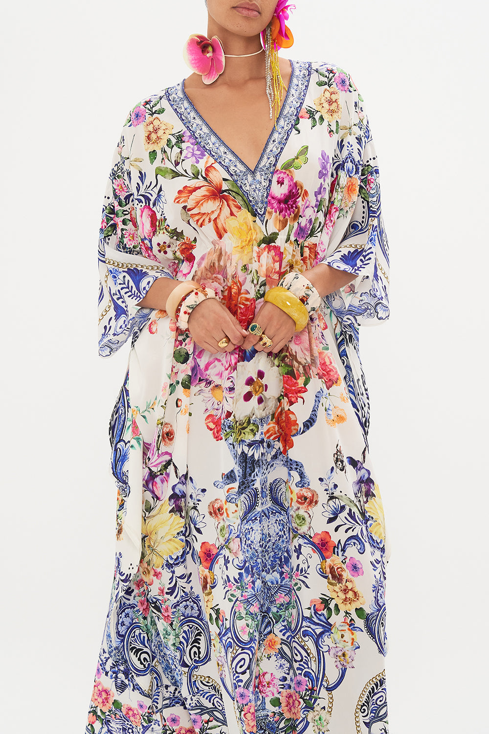 Crop view of model wearing CAMILLA silk kaftan in Dutch Is Life print