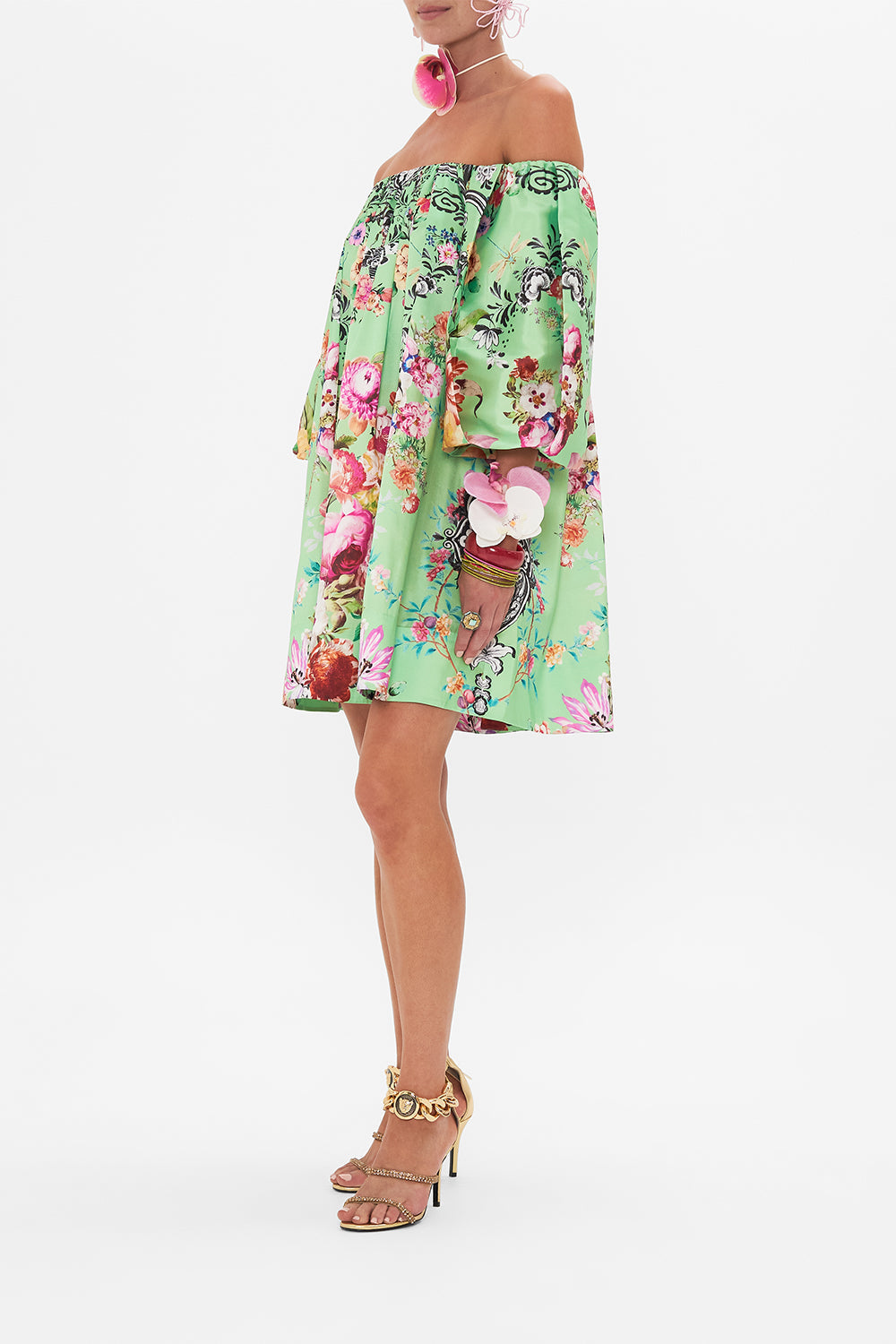 Side view of model wearing CAMILLA pudd sleeve dress in Porcelain Dream print