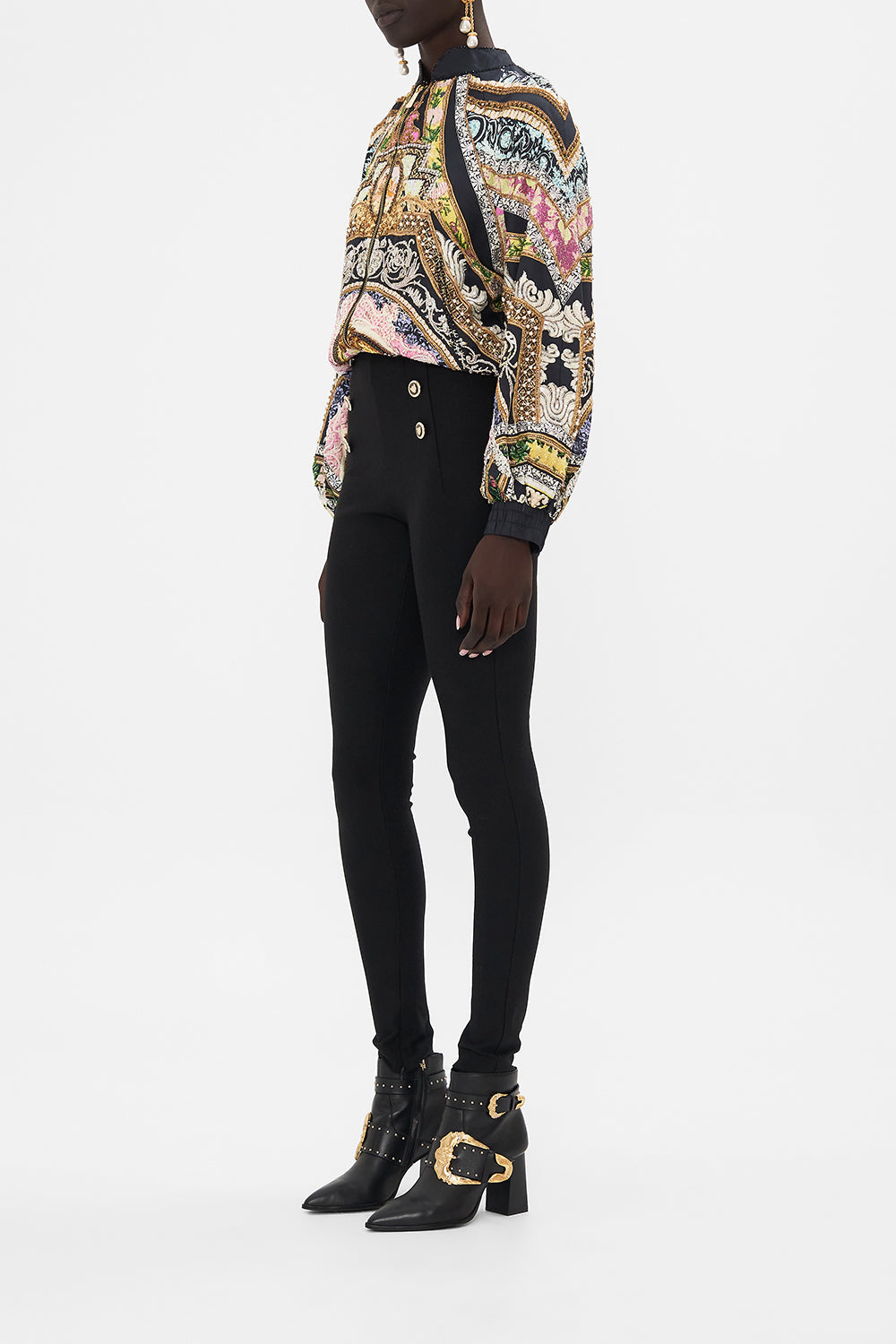 Side view of model wearing CAMILLA silk bomber jacket in Florence Field Day Print