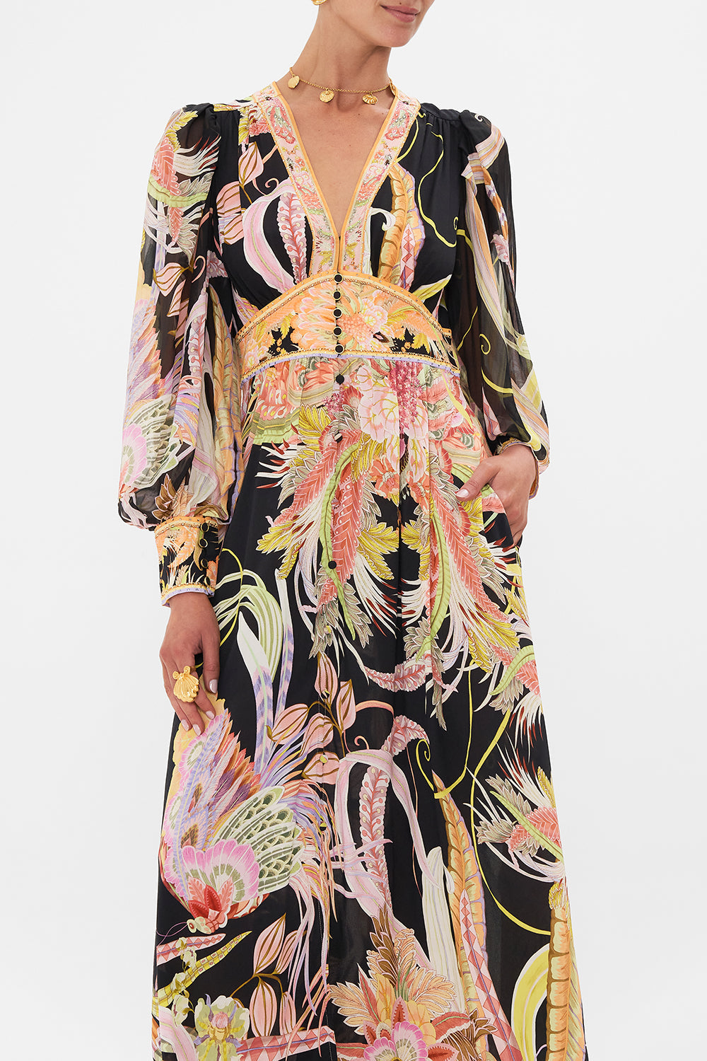 Crop view of model wearing CAMILLA designer silk dress in Lady Of The Moon print