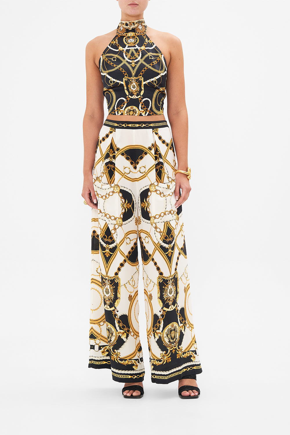 Front view of model wearing CAMILLA silk palazzo pants in Sea Charm print