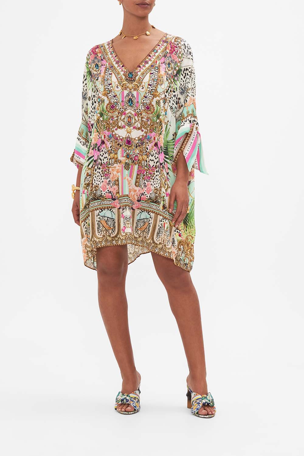 Front view of model wearing CAMILLA printed silk kaftan in Dear Amore Mio print
